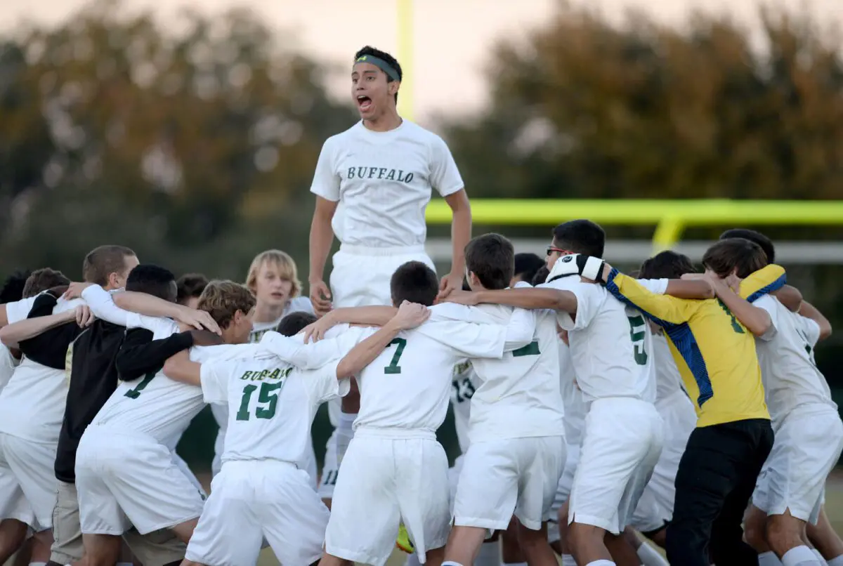 Peter Travers / Daily Sun - Rafael Perez, of The Villages High School, and his teammates cheer prior to the Class 2A regional quarterfinal game with Keystone Heights on Thursday, January 29, 2015.