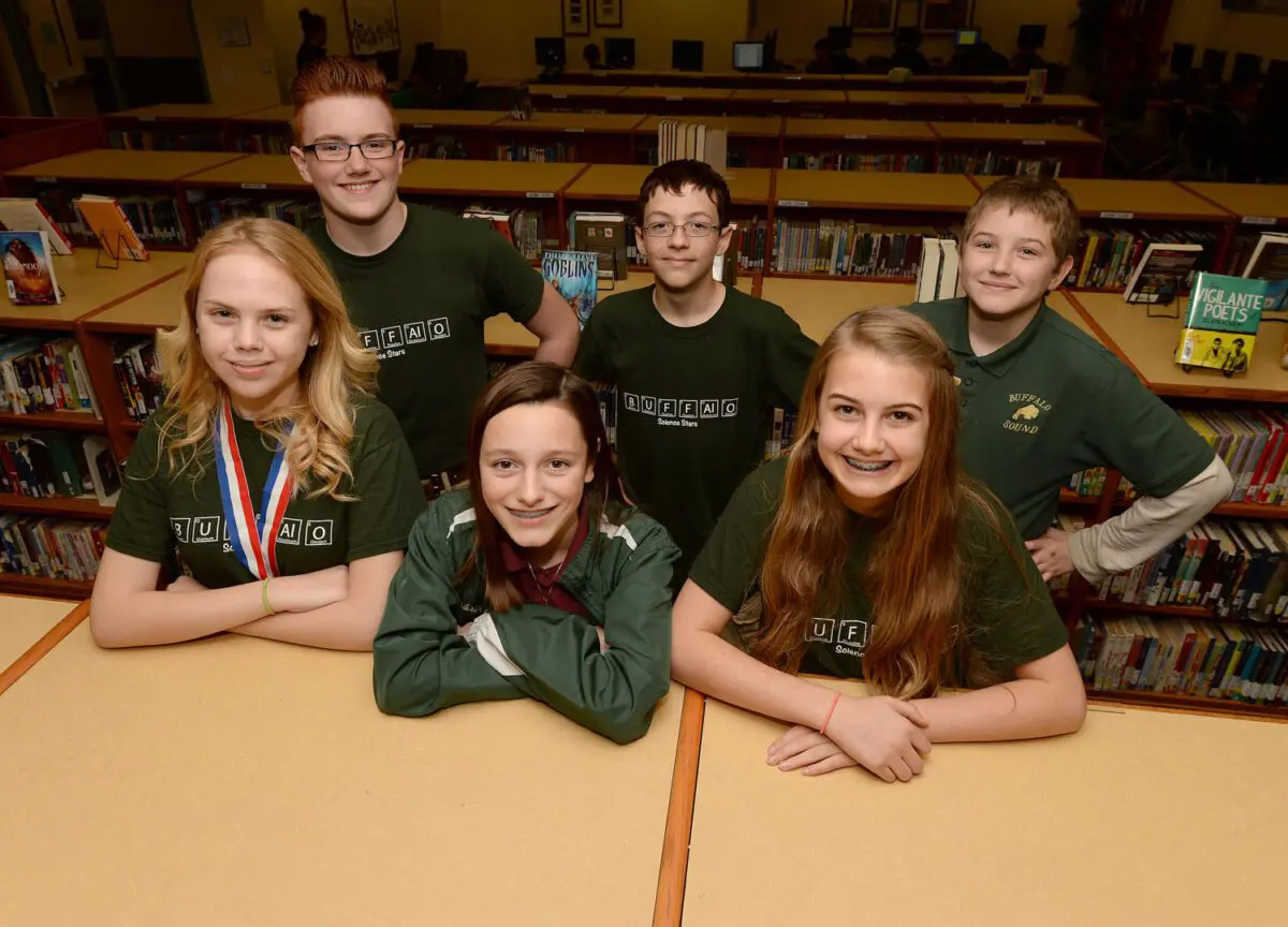 George Horsford / Daily Sun - Students from The Villages Charter Middle School, front row left to right, Randa Shaw, {cq}, Sabrina Mead, {cq}, Kayle Cunningham, {cq}, back row left to right, Kevin Matos, {cq}, Alex Homs, {cq}, and Ryan Graham, {cq}, each received a first place in their category of the Big Springs Regional Science Fair as seen in the school's media center on February 17, 2015.