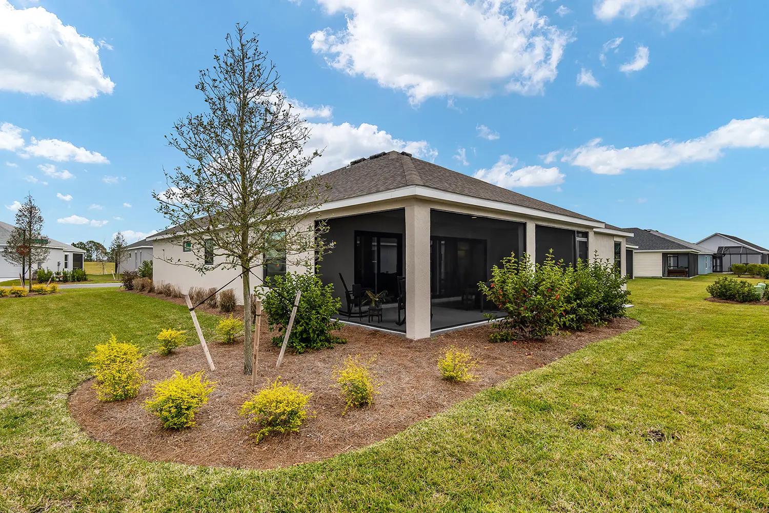 designer-dove-street-of-dreams-exterior-rear-lanai-2