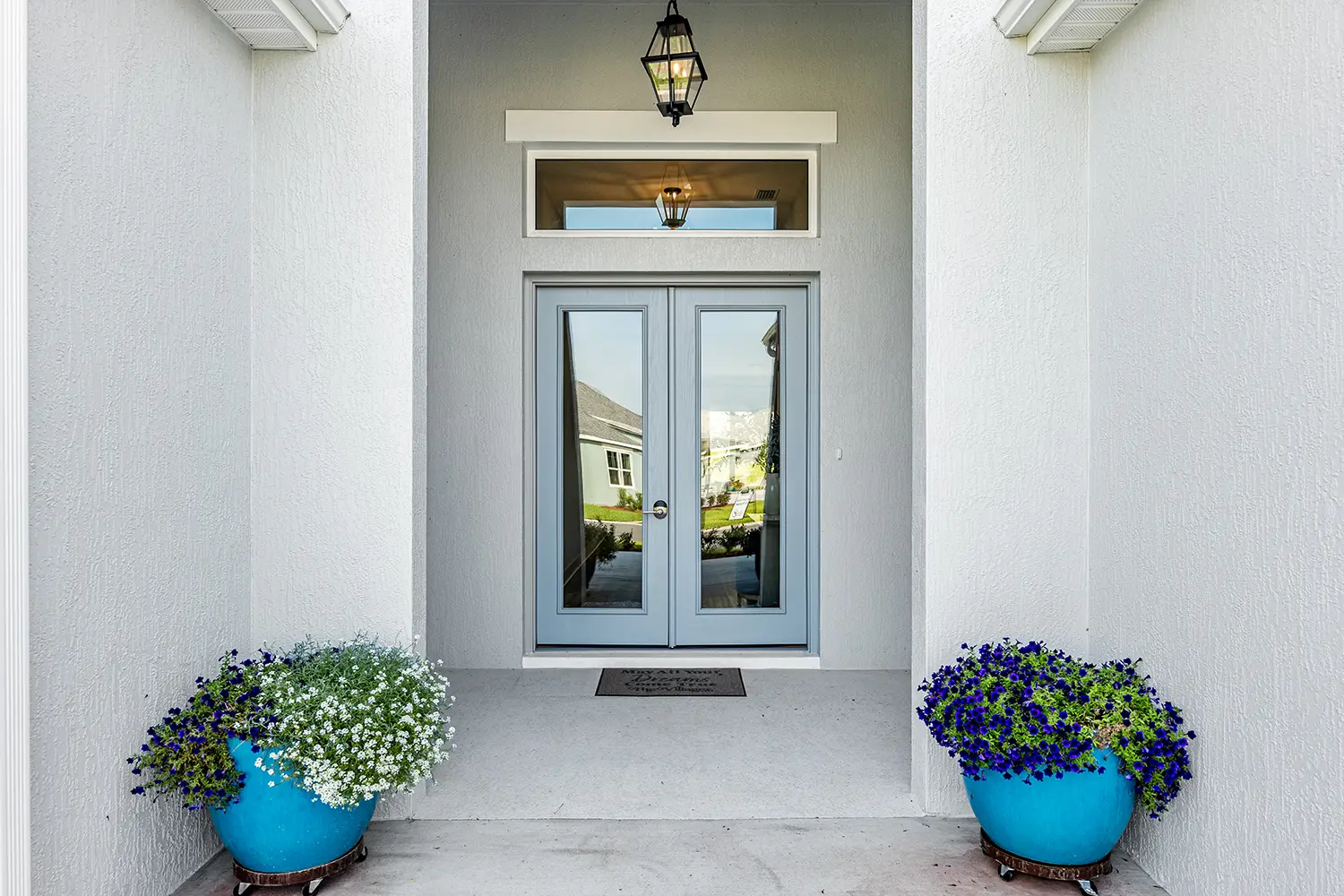 premier-egret-street-of-dreams-exterior-entry-french-doors