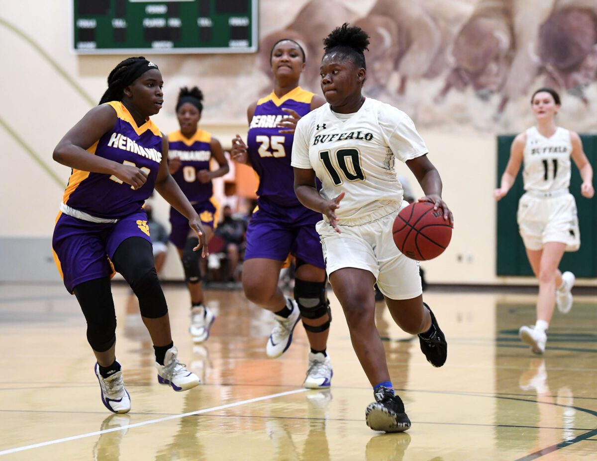 Bill Mitchell / Daily Sun - Re'Nae Brant (10), of The Villages High School makes her way to the basket during girls basketball action against Hernando High School, Monday, January 11th, 2021, at The Villages High School