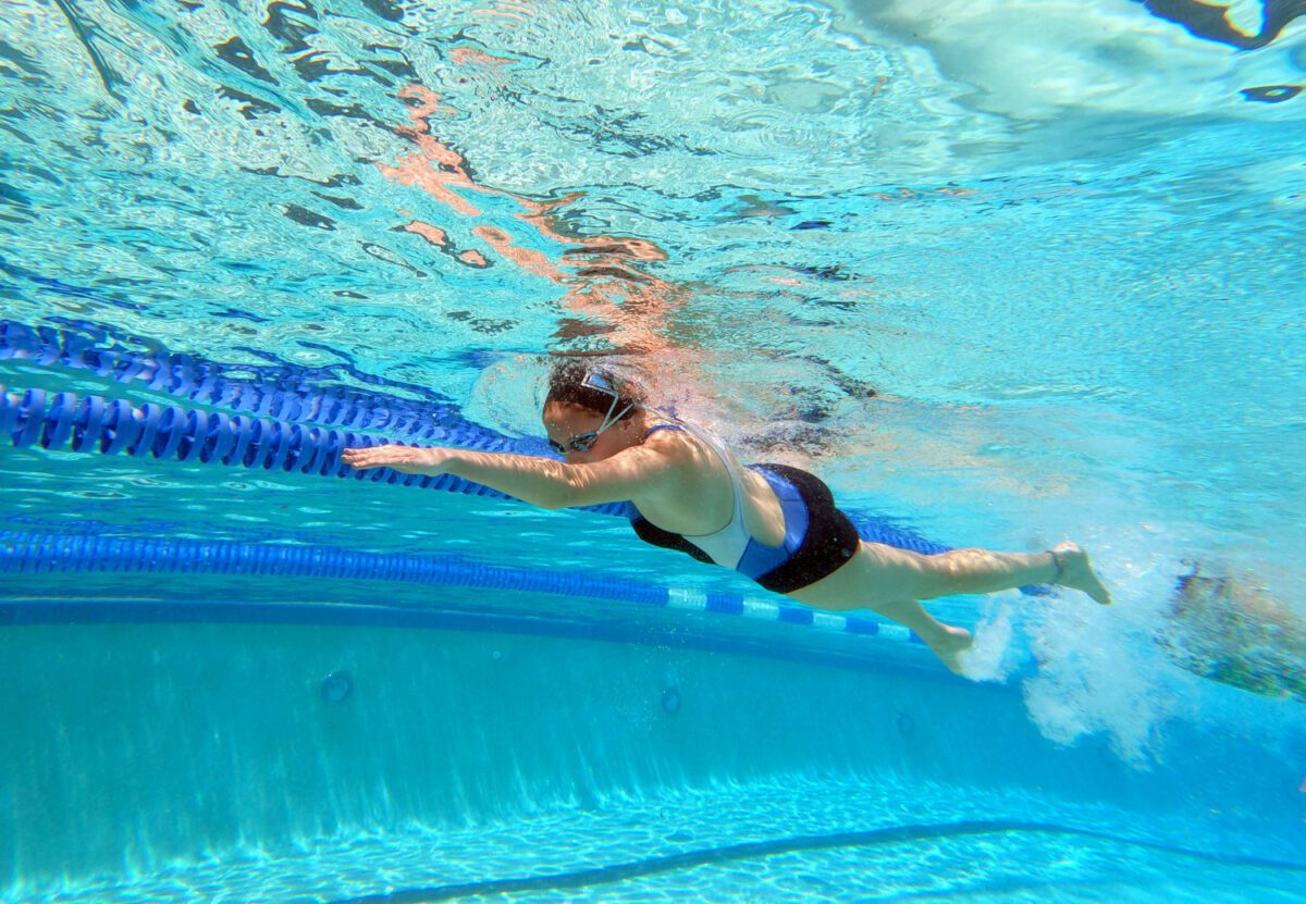 Bill Mitchell / Daily Sun - Meg Ireland of The Villages High School swims laps, Monday, July 26th, 2021, during conditioning drills at the Laurel Manor Regional Recreation Complex sports pool.