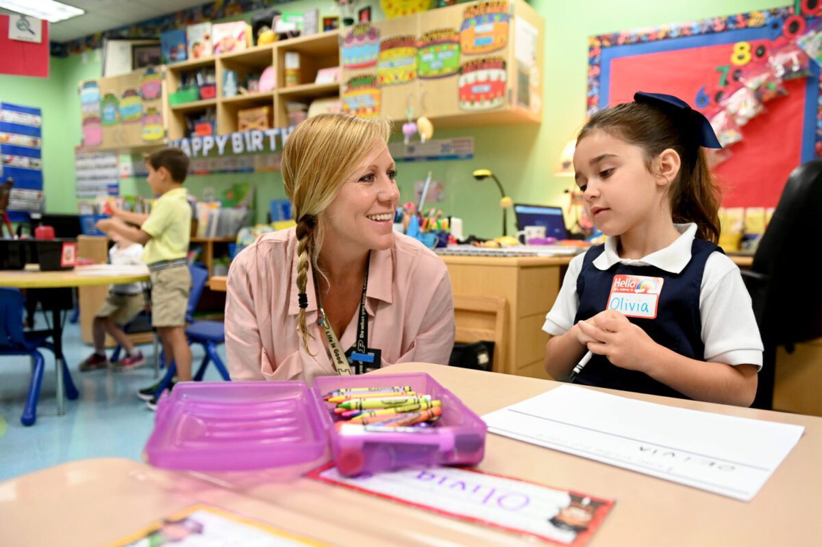 Max Gersh / Daily Sun - Kindergarten teacher Andi Homan talks with Olivia Williams, 5, on Thursday, Aug. 8, 2019, at The Villages Charter Elementary School Primary Center.