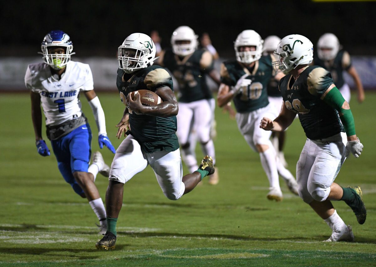 Bill Mitchell / Daily Sun - Ed Williams, (cq), (26), of The Villages High School rushes for a 50 yard touchdown during football action against East Lake High School, Friday, September 17th, 2021, at The H.G. Morse Range.