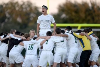 Peter Travers / Daily Sun - Rafael Perez, of The Villages High School, and his teammates cheer prior to the Class 2A regional quarterfinal game with Keystone Heights on Thursday, January 29, 2015.