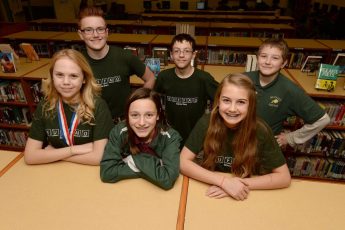 George Horsford / Daily Sun - Students from The Villages Charter Middle School, front row left to right, Randa Shaw, {cq}, Sabrina Mead, {cq}, Kayle Cunningham, {cq}, back row left to right, Kevin Matos, {cq}, Alex Homs, {cq}, and Ryan Graham, {cq}, each received a first place in their category of the Big Springs Regional Science Fair as seen in the school's media center on February 17, 2015.