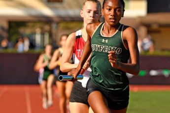 George Horsford / Daily Sun - Lia Byron, {cq}, an eleventh grade member of The Villages High School Track and Field team and the lead runner for the girls’ 4 x 800 meter relay team, takes the lead of the race during The Villages High School track meet on February 24, 2022.